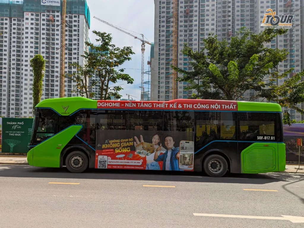 A public bus cruising through Hau Giang Street